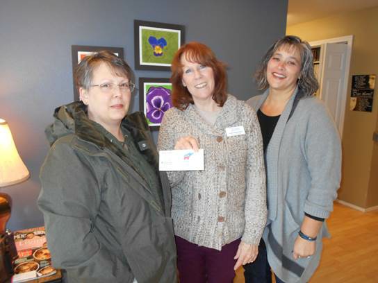Becky DeKorte gives donation to My Choice